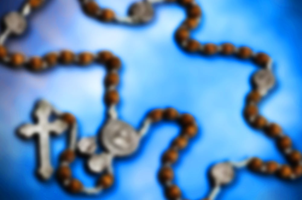 Rosary with steel crucifix and wooden beads