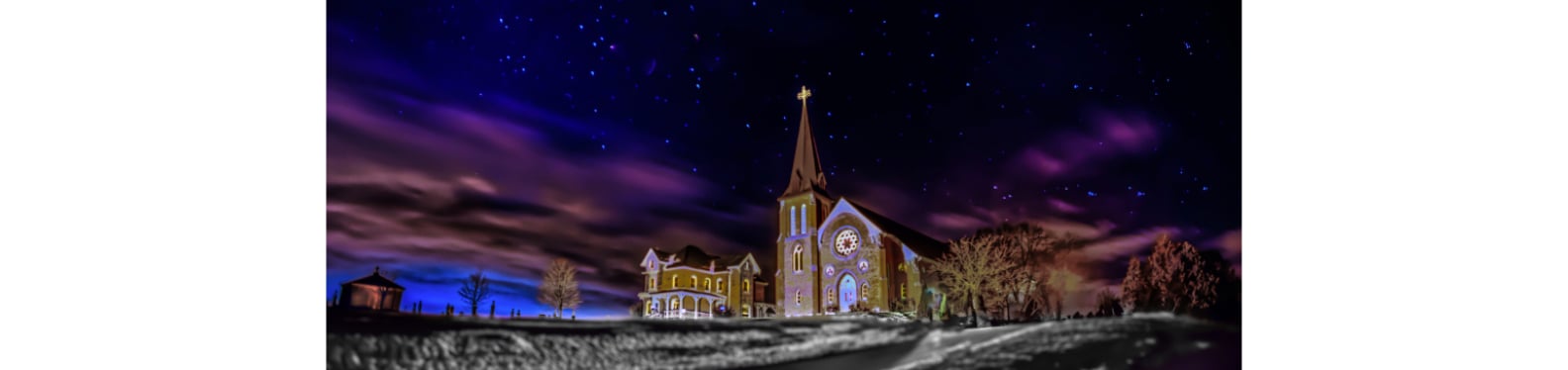 St Columbkille exterior at night with stars