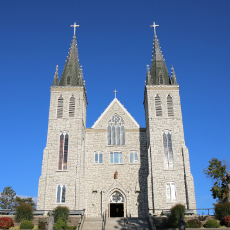 Martyrs Shrine exterior showing steps and two tall spires