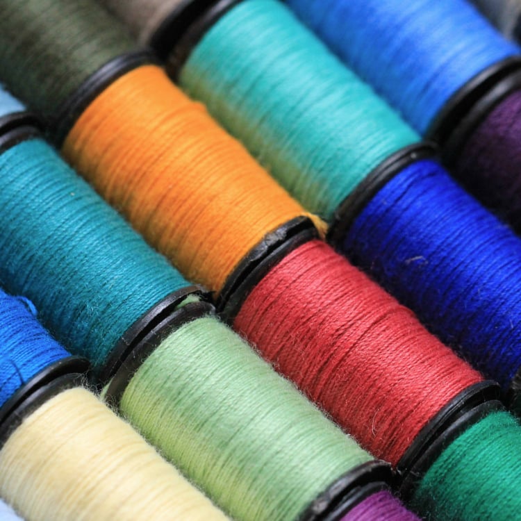 Various spools of coloured Thread