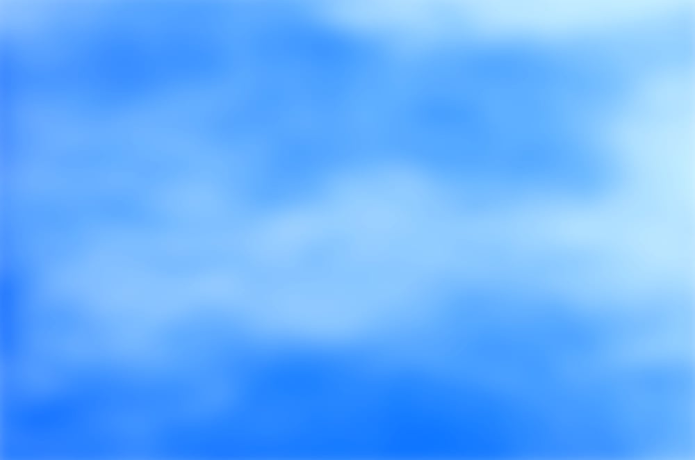 Blue sky and puffy clouds
